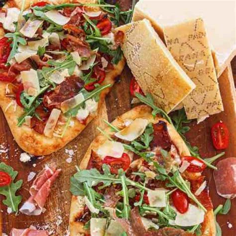 Hot Honey Prosciutto Di Parma And Grana Padano Cheese Flatbread Evs Eats