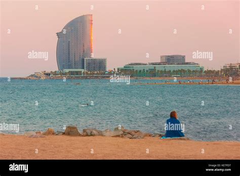 Barceloneta Beach in Barcelona at sunset, Spain Stock Photo - Alamy