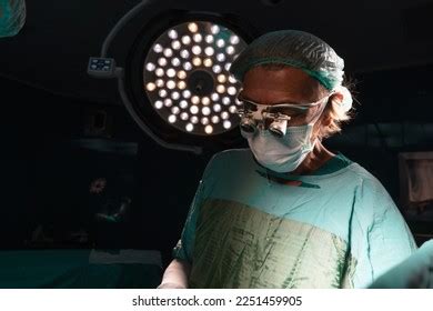 Doctor Performing Surgery Doctors Green Uniforms Stock Photo 2251459905 | Shutterstock