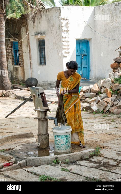 Indian Woman Washing Clothes At A Rural Village Hand Pump Andhra