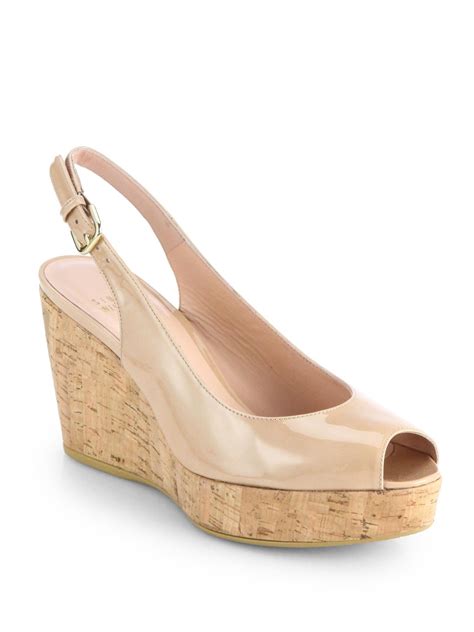 Lyst Stuart Weitzman Jean Patent Leather Slingback Wedge Pumps In Natural