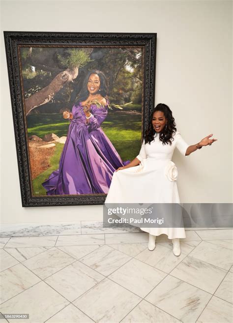 Oprah Winfrey Poses In Front Of Her Newly Unveiled Portrait At The