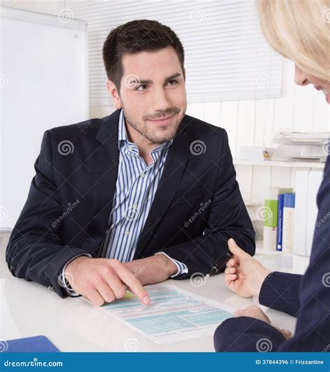 Consultation At Office Between Consultant And Customer Stock Photo