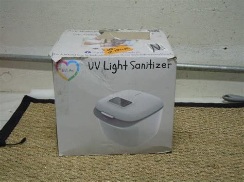 UV LIGHT SANITIZER | www.redstarauctions.com