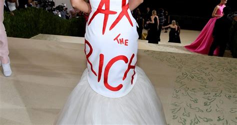 AOC Wears "Tax The Rich" Dress to Met Gala - The Outlook