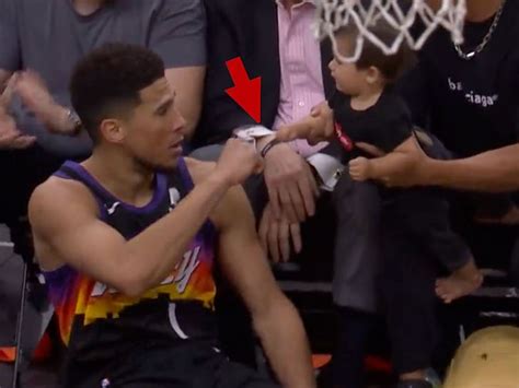 Devin Booker Fist Bumps Baby Mid-Play In Suns' Playoff Game