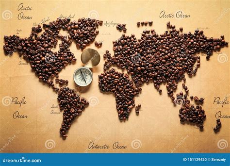 World Map Made Of Roasted Coffee Beans With Compass Top View Stock