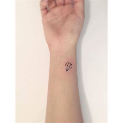 Minimalistic Style Diamond Tattoo Located On The Wrist