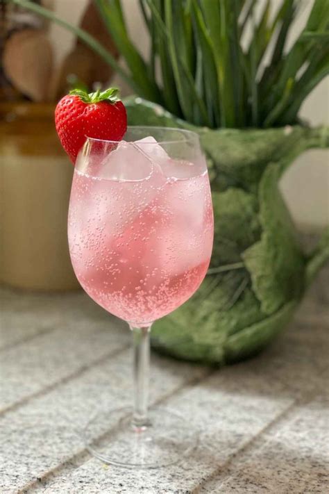 An easy cocktail recipe that turns the Gin Spritz a gorgeous pink color ...