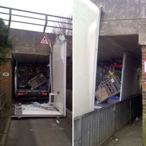 The Moment A Hapless Lorry Driver Gets His Truck Jammed Under A Low