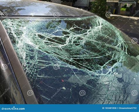 Broken Glass Of The Broken Windshield After A Heavy Car Accident Ruined The Windscreen And