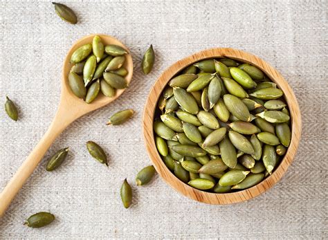 8 Surprising Side Effects of Eating Pumpkin Seeds, Say Dietitians — Eat ...