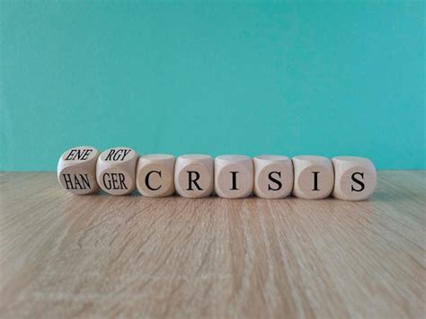 Premium Photo A Row Of Dice With The Word Crisis On It Energy Or