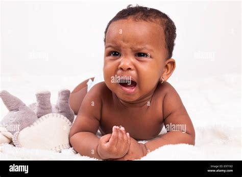 Adorable little african american baby girl crying - Black people Stock ...