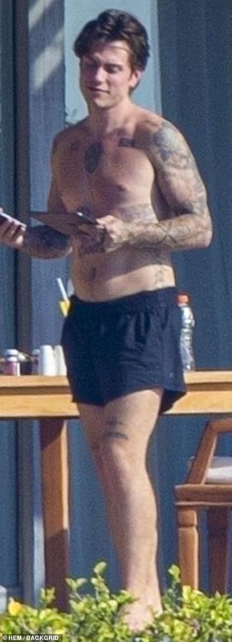 Bella Thorne Puts On A Cheeky Display In Bikini Before Changing Into Plunging Bridesmaid Gown