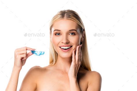 Naked Smiling Blonde Woman With White Teeth Holding Mouth Guard