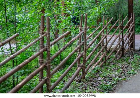 Elegant Wooden Fence On Green Background Stock Photo 1540032998