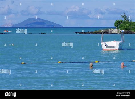 Round Island, Mauritius from the coast at Calodyne Stock Photo - Alamy