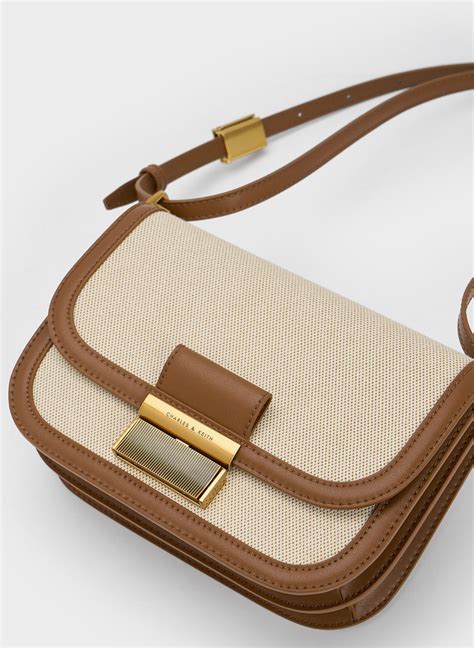 Chocolate Charlot Canvas Crossbody Bag Charles And Keith Us