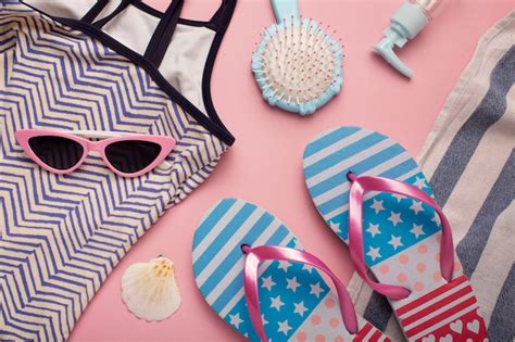 Free Photo View Of Flip Flops With Summer Essentials And Bikini