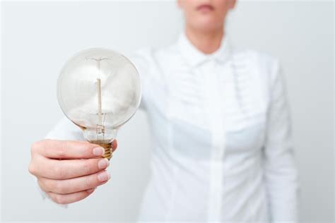 Premium Photo Midsection Of Man Holding Glass Against White Background