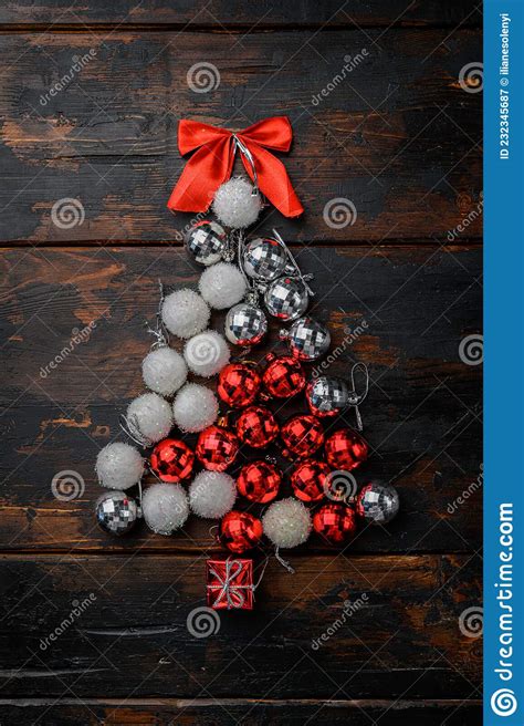 Christmas Tree From Toys Concept On Old Dark Wooden Table Background Top View Flat Lay Stock