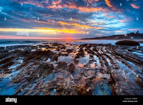 California- Crystal Cove, Laguna Beach, Sunset with water motion Stock ...