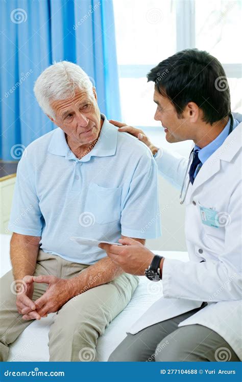 Consultation Doctor And Old Man In Hospital Room With Advice Help And