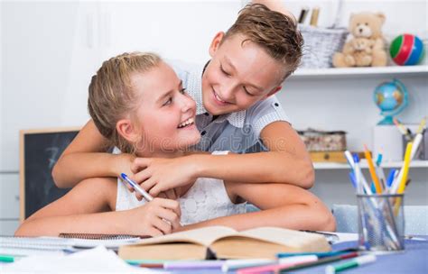 Brother Is Helping Sister With Homework Stock Image Image Of Helping