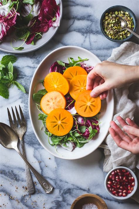 Persimmon Pomegranate Salad With Burrata Pistachio Dukkah • The