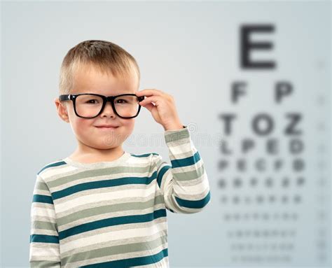 Happy Boy Eyeglasses Over Eye Chart Stock Photos Free And Royalty Free