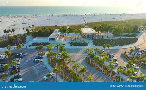 View From Above Of Beachfront Car Parking Area For Tourist Vehicles At