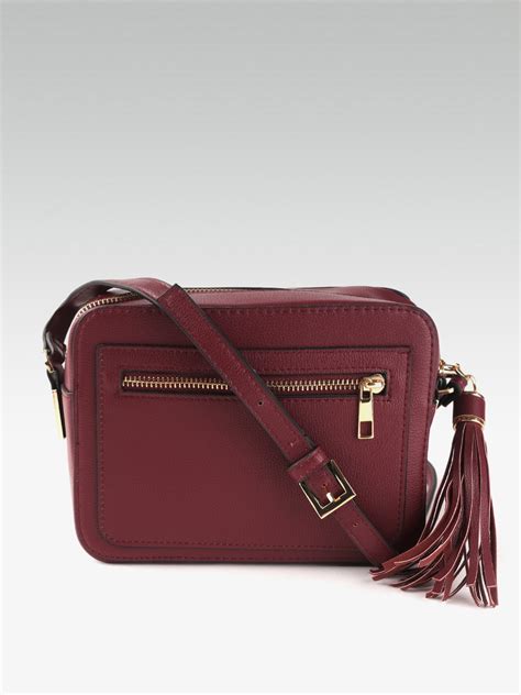 Buy Dorothy Perkins Burgundy Solid Sling Bag With Non Detachable Sling Strap Handbags For