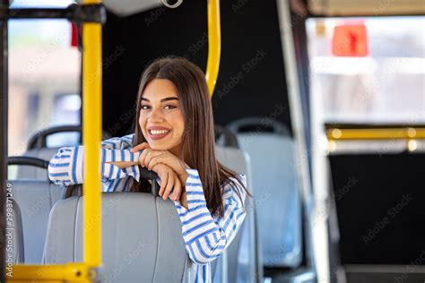 Portrait Of A Woman Inside A Bus Beautiful Young Woman Taking Bus To Work Woman Riding In A