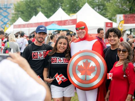 Revellers Brave Smoggy Skies And Hot Humid Weather To Mark Canada Day