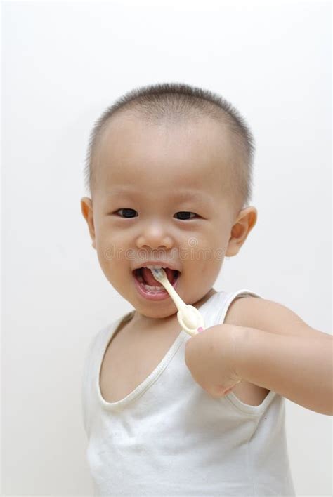 Baby Brushing Teeth Stock Photography - Image: 15674822