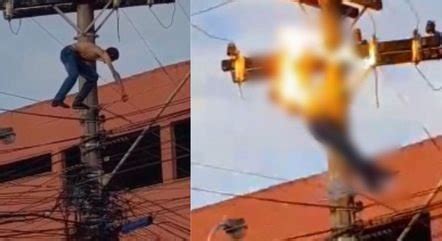 Homem Alcoolizado Sobe Em Poste De Energia Se Equilibra Em Fios Toma