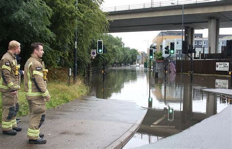 Post News: Flooding hits London leaving Tube stations and streets ...