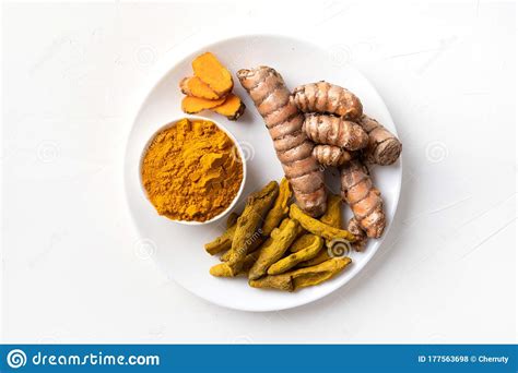 Fresh And Dry Root Turmeric Curcuma Powder On Light Background Space