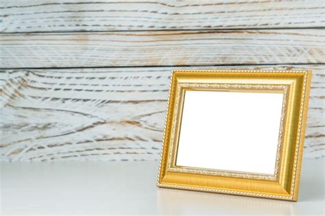 Gouden Frame Met Houten Achtergrond Gratis Foto