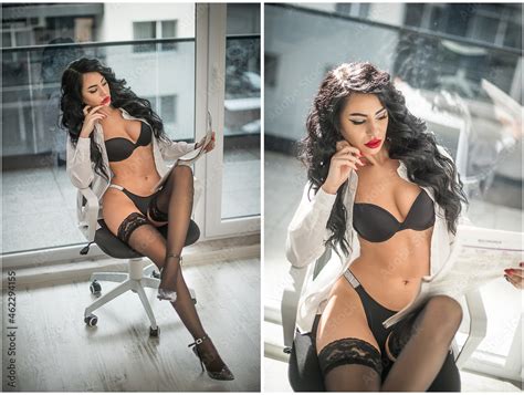 Attractive Woman In Black Lingerie And Long Legs Posing And Reading The Newspaper In Front Of A