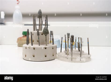 instruments and accessories in the dental laboratory workplace dental technician Stock Photo - Alamy