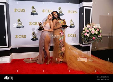 Doja Cat and SZA pose with their Grammys for Best Pop Duo Group ...