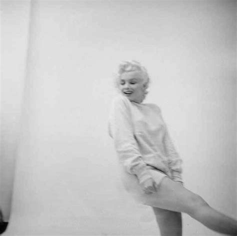 Marilyn White Sweater Sitting Photo By Milton Greene Attrici