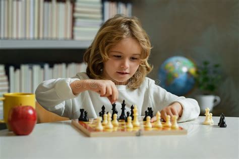 Chess Game for Kids. Child Playing Chess. Stock Photo - Image of ...