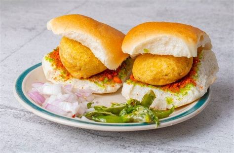 Premium Photo | Indian famous street food vada pav | Indian fast food ...