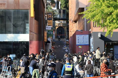 Narrow alleyways of Itaewon trap Halloween crowds