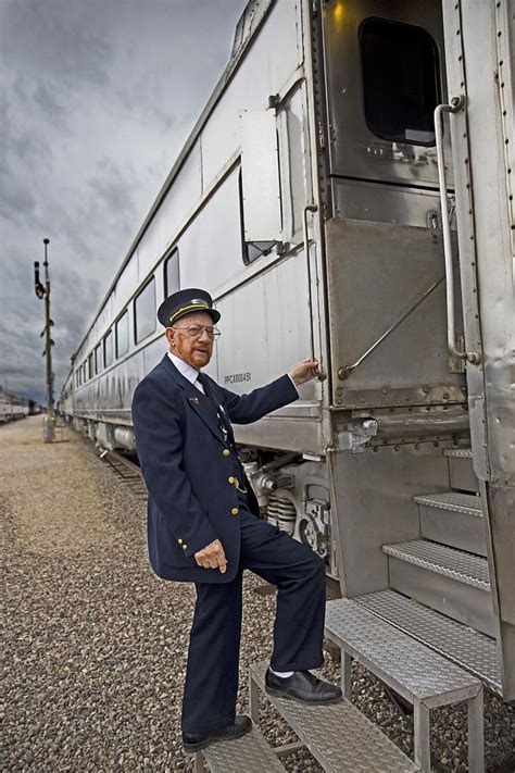 The Train Conductor Photograph by Sue Cullumber