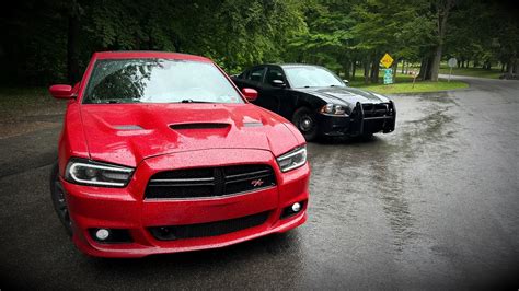 Two L Awd Dodge Chargers Take Over The Streets In The Rain Pov