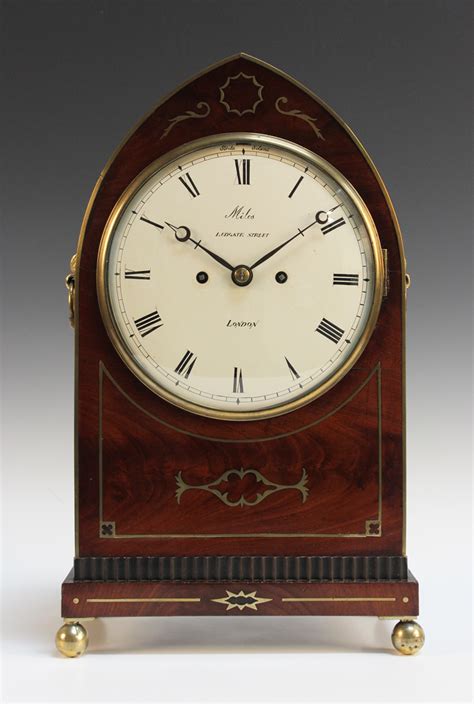 A Regency Brass Inlaid Mahogany Table Clock With Eight Day Twin Fusee